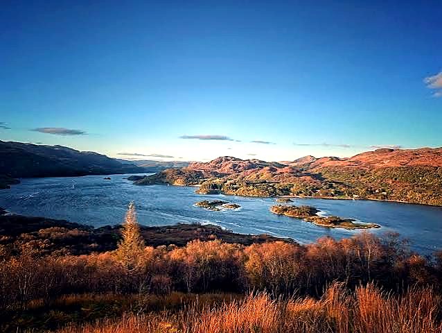 Autumn colours above the Kyles of Bute, looking over the water to the Argyll hills