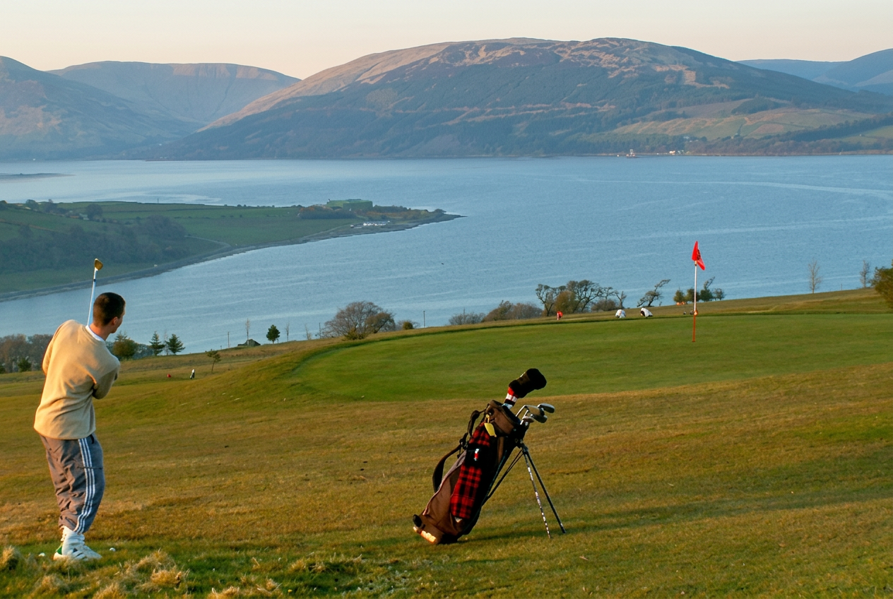 Golfer on the high course at Port Bannatyne overlooking the Kyles of Bute