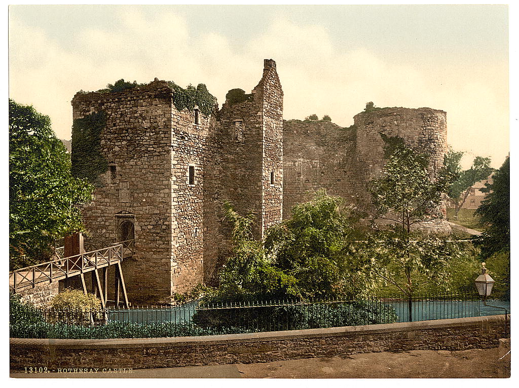 A Victorian photochrom view of Rothesay Castle, its towers and drawbridge over the moat