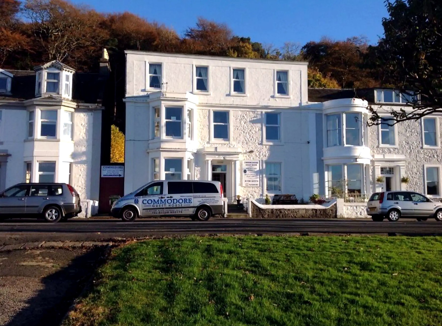 The white frontage of Commodore Guest House on Rothesay's seafront