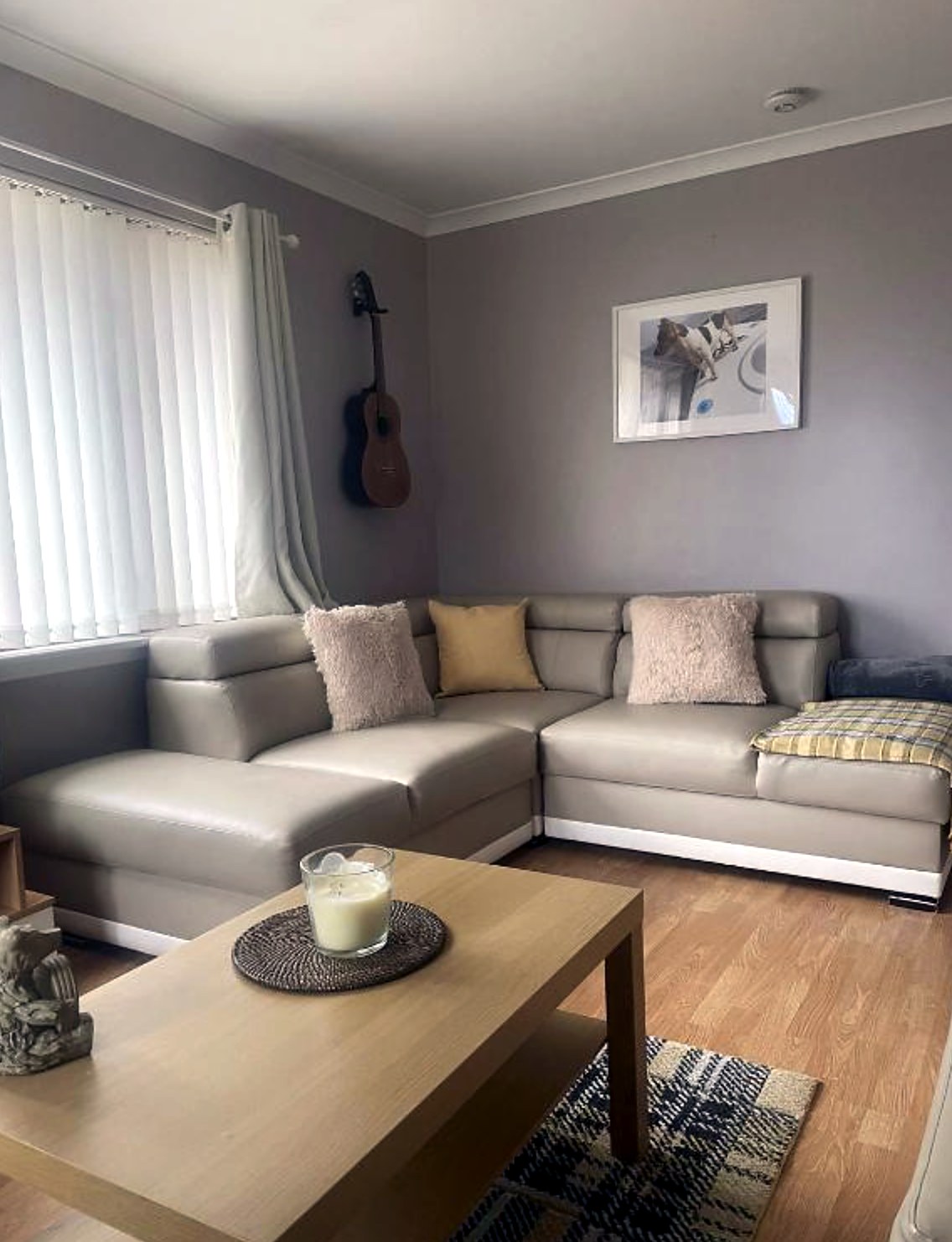 Corner sofa and coffee table in the living room at Fraoch, Port Bannatyne