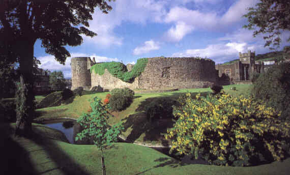 The circular curtain wall and water-filled moat of Rothesay Castle