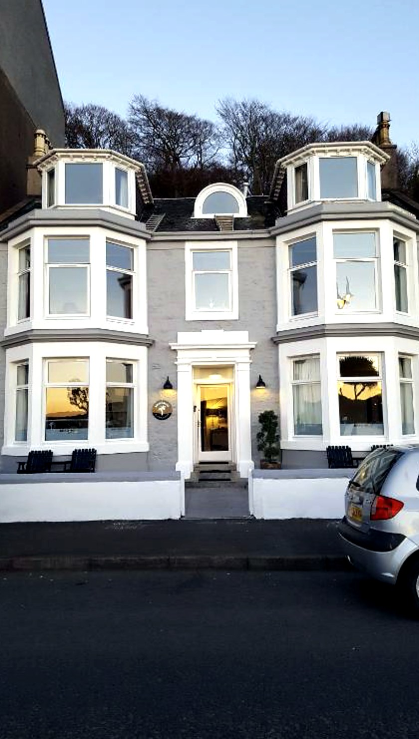 White and grey Victorian villa with bay windows on Rothesay's seafront