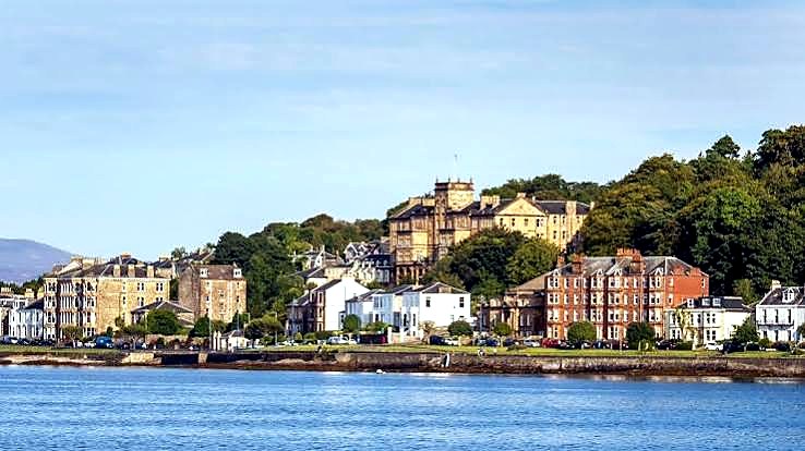 Rothesay's Victorian villas and wooded hillside seen from the Firth of Clyde