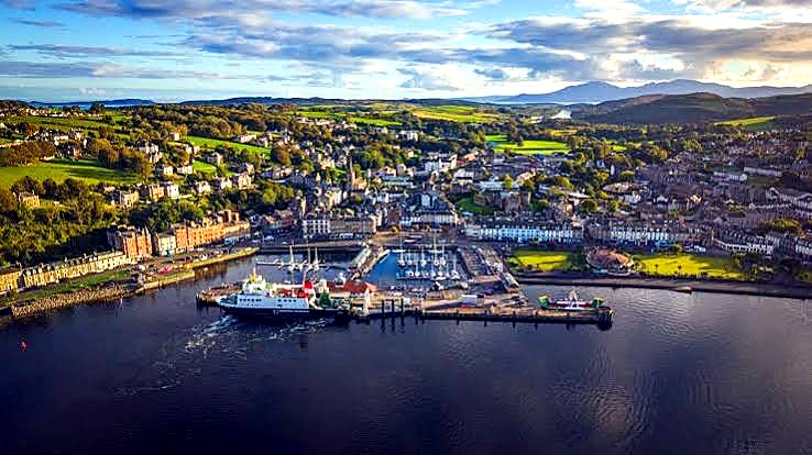 Aerial view of Rothesay on the Isle of Bute with the Calmac ferry berthed at the pier