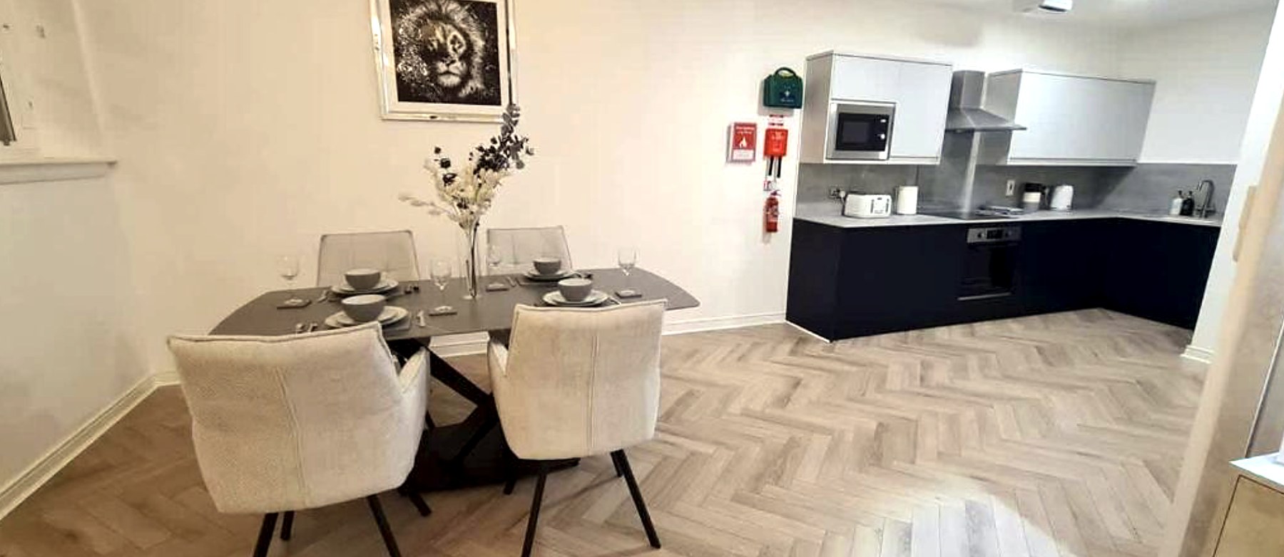 Modern fitted kitchen and dining table at The Old Courthouse