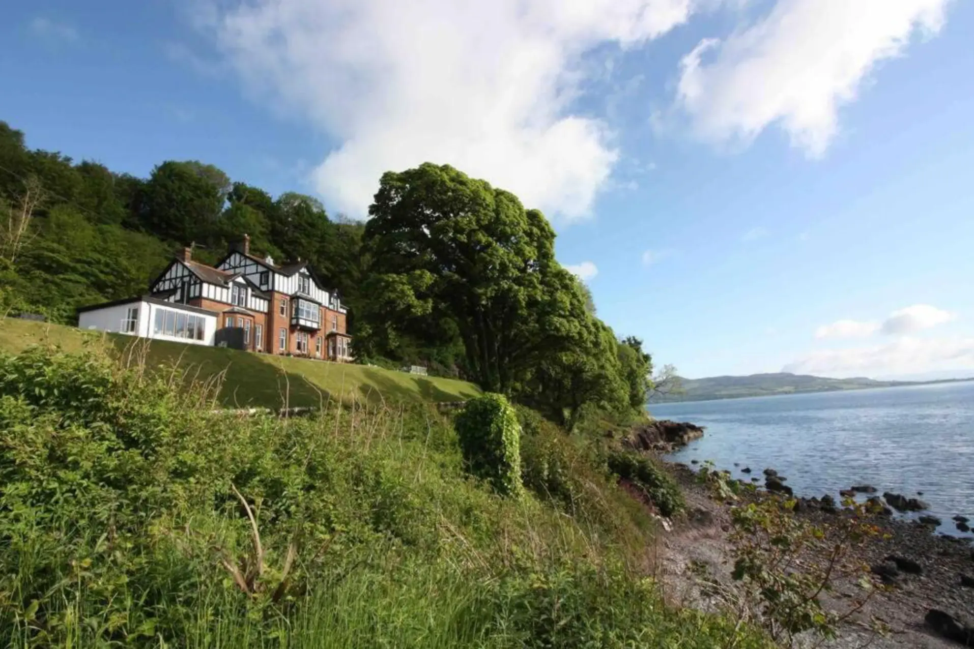 Chandlers on the wooded shoreline of the Isle of Bute